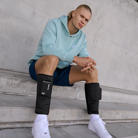 Haaland wearing normatec legs