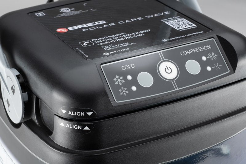 Control panel of a Breg Polar Care Wave machine with various buttons and labels.