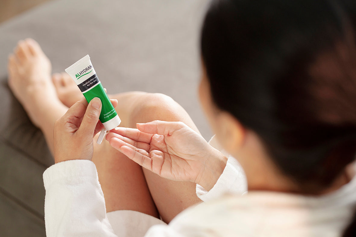 Person applying Alhydran scar removal cream