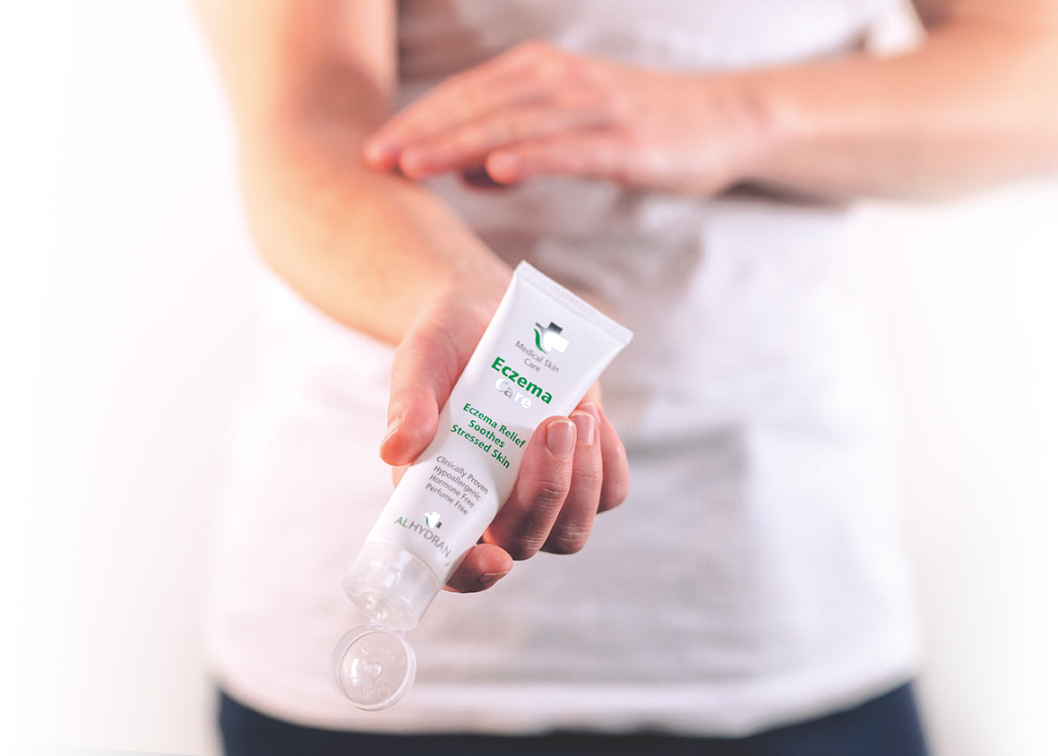 Applying ALHYDRAN Eczema Care cream to eczema on hands – hydrating relief for sensitive skin
