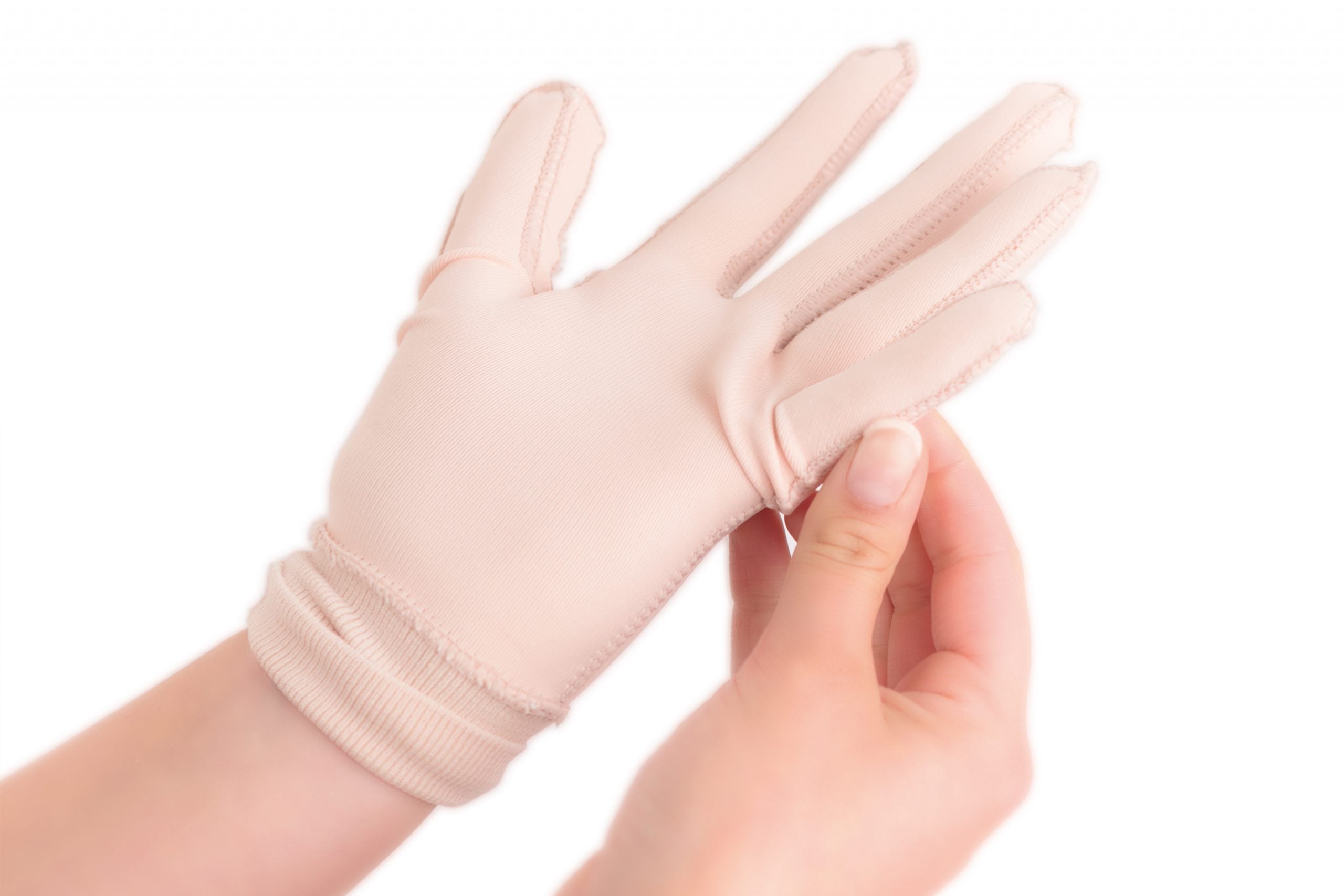 Scarban silicone scar gloves worn on hand to support healing of burn scars and post-trauma skin