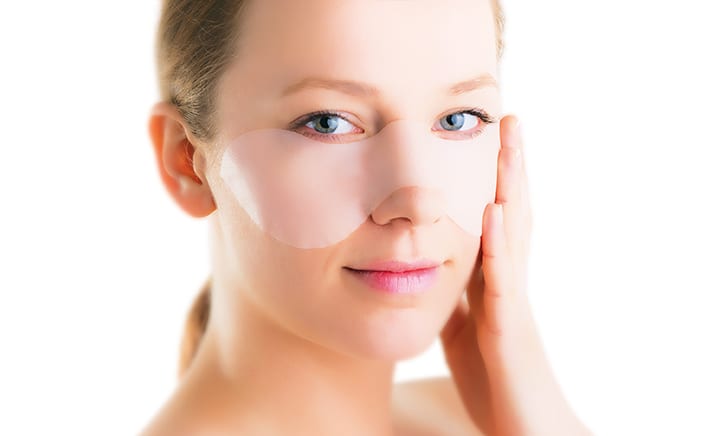 Woman wearing scarban nose: silicone sheeting for scars